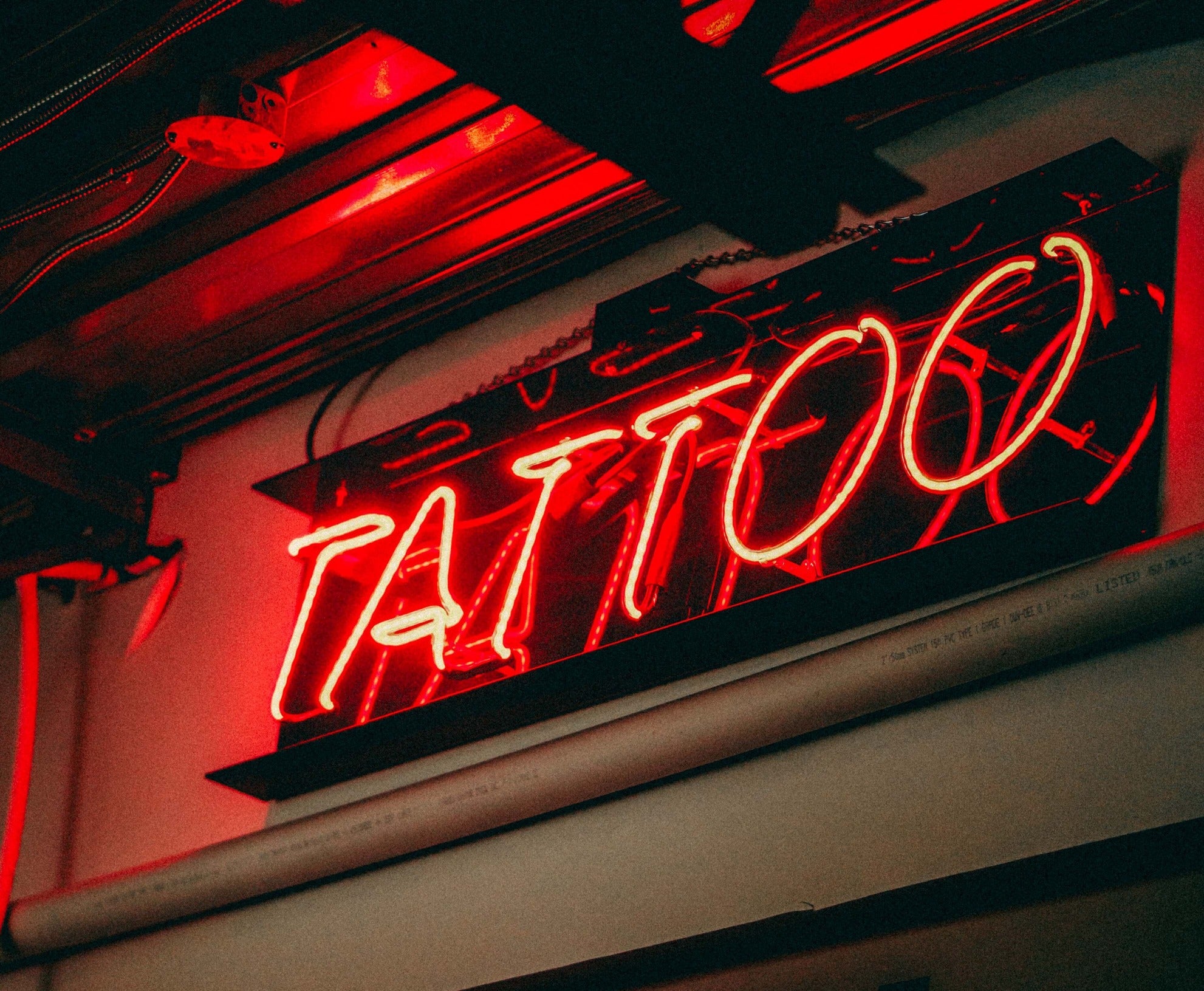 Unveiling the Vibrant Truth: Red Light Therapy and Tattoos